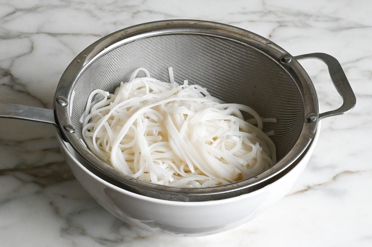 rice noodles in strainer