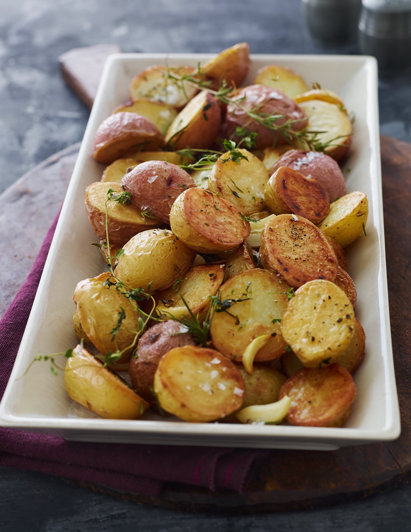Roasted potatoes on a serving platter.
