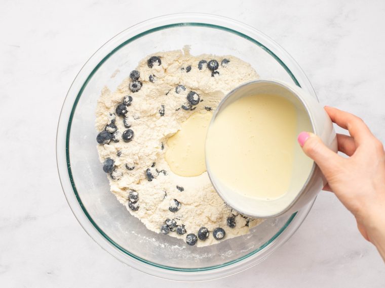 adding the wet ingredients to the dry ingredients
