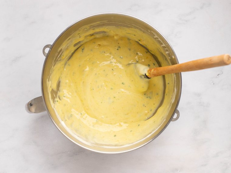 Spatula in a bowl of soufflé mixture.