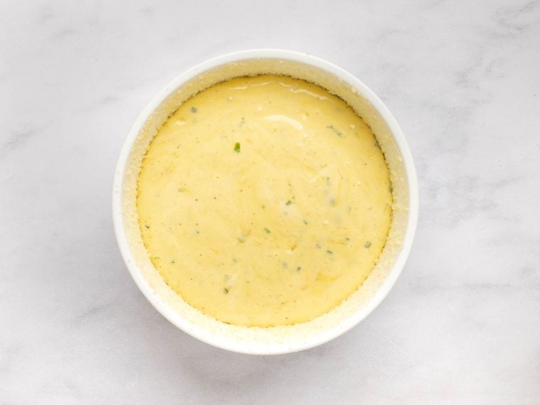 soufflé mixture in prepared dish