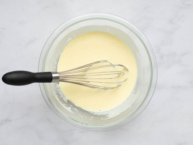 whisked wet ingredients for waffles.