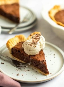 sliced chocolate brownie pie with ice cream