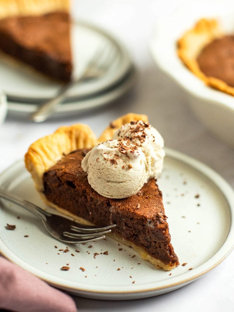 sliced chocolate brownie pie with ice cream