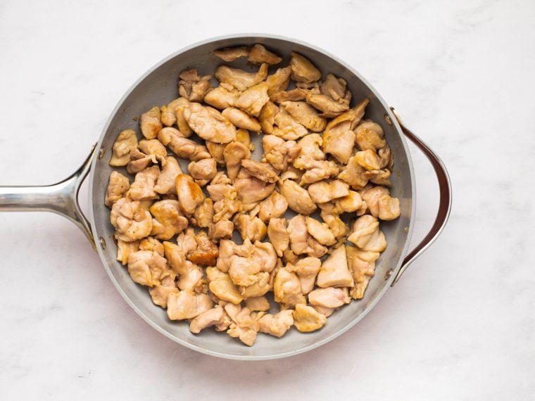 golden brown chicken in skillet