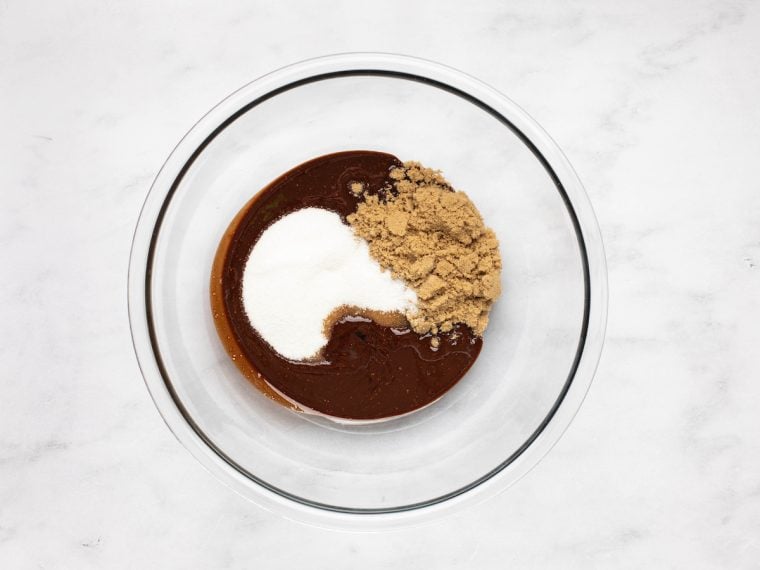 vanilla, granulated sugar, and brown sugar added to melted chocolate/butter mixture