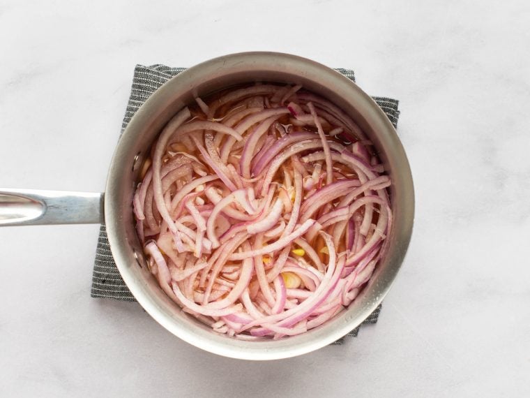 onions sitting in vinegar mixture