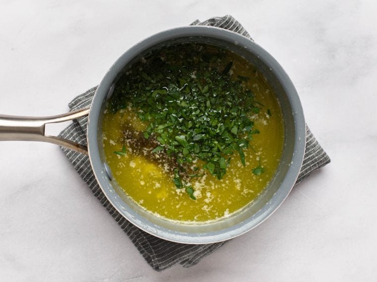 stirring in the salt, pepper, and parsley