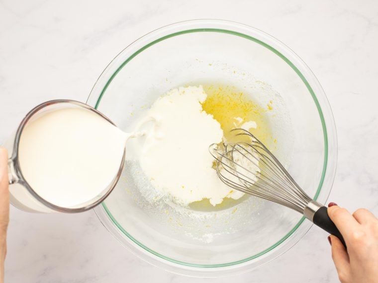 whisking lemon zest, lemon juice, sugar, and salt together and adding half and half