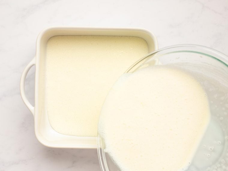 pouring mixture into shallow container