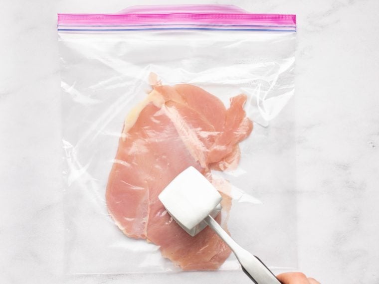 pounding chicken breasts to 1/2-inch thickness