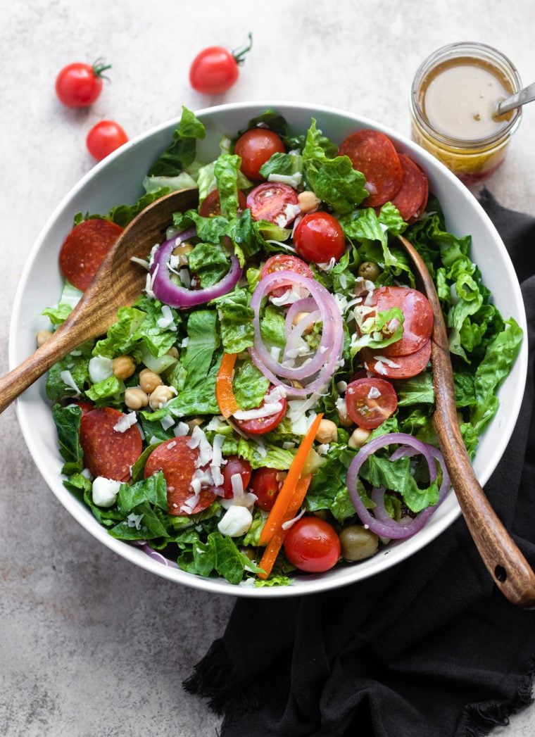 tossing antipasto salad