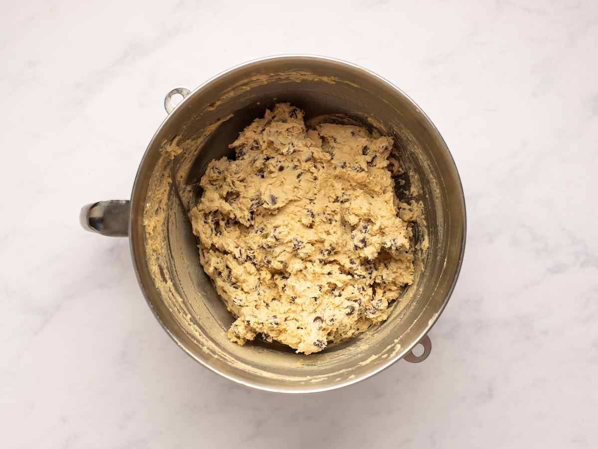 chocolate chips mixed into cookie dough