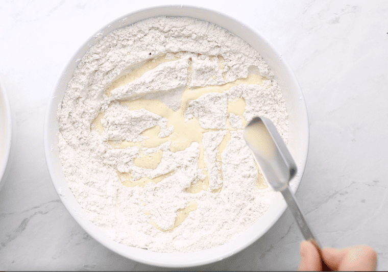 adding egg mixture to the dry ingredients