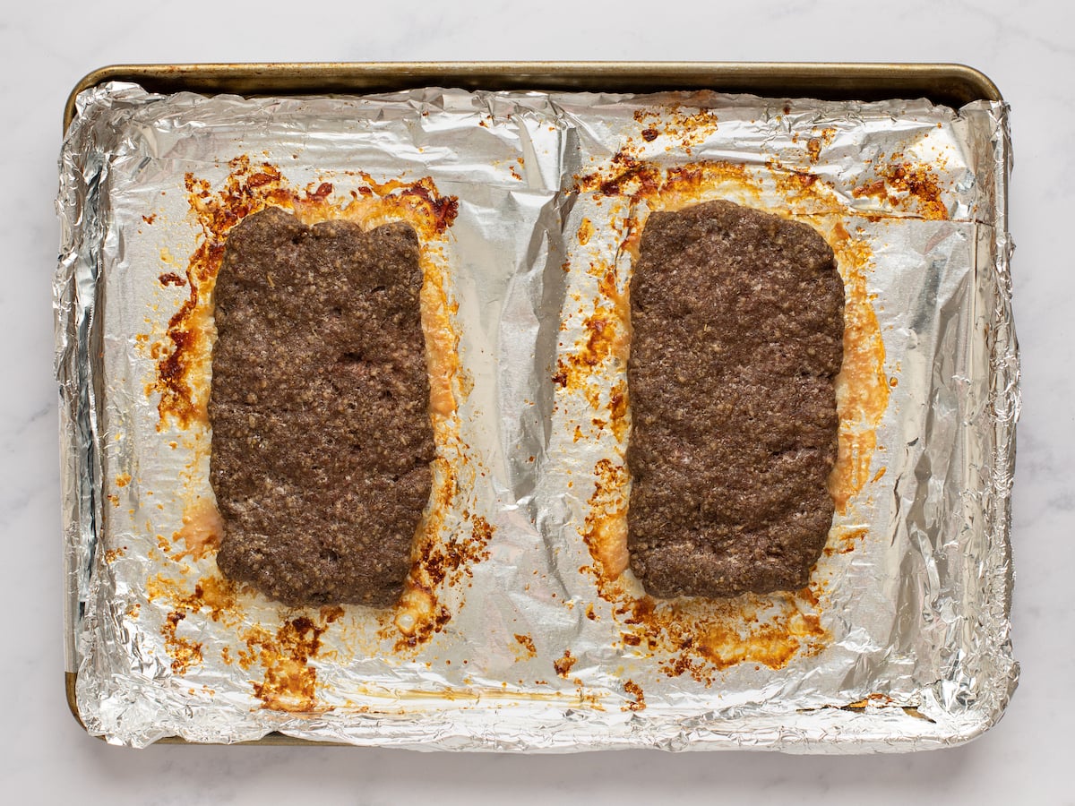 Baked loaves on the baking sheet.