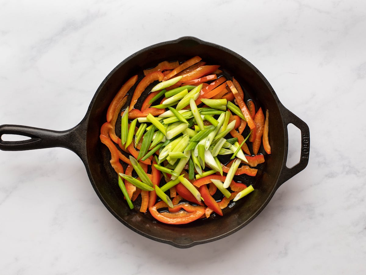 scallions added to pan