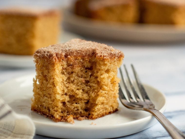 slice of apple cider donut cake on plate