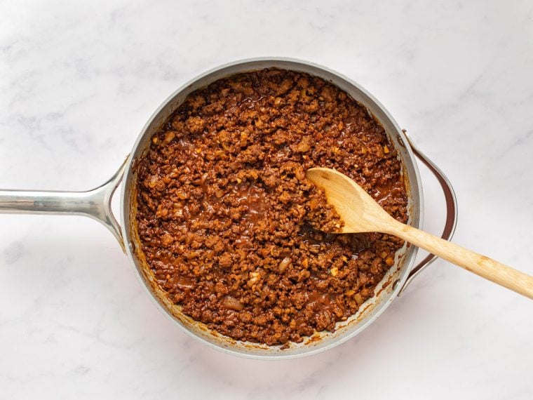 cooked beef taco mixture in skillet