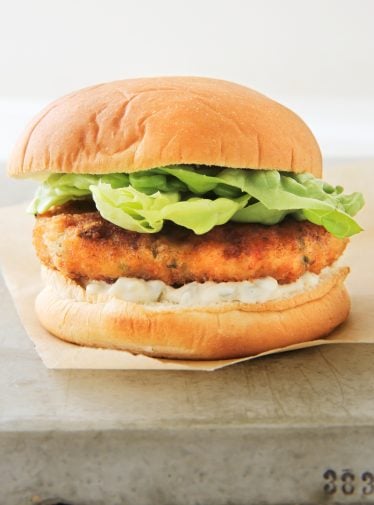 Shrimp burger on parchment paper.
