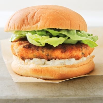 Shrimp burger on parchment paper.