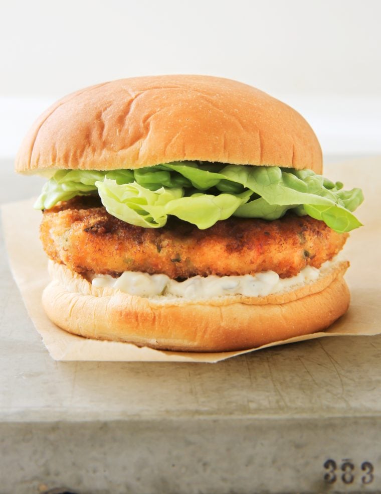 Shrimp burger on parchment paper.