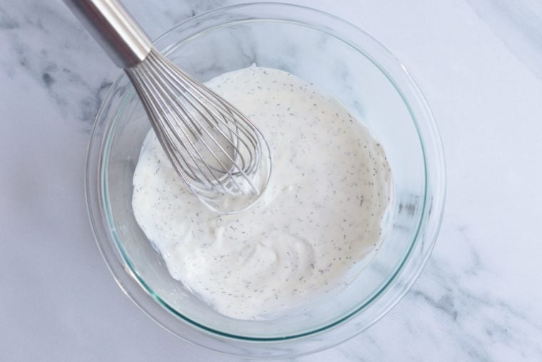 mayonnaise, lemon juice, garlic, dill, and salt whisked together