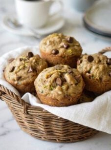 Basket filled with zucchini muffins.