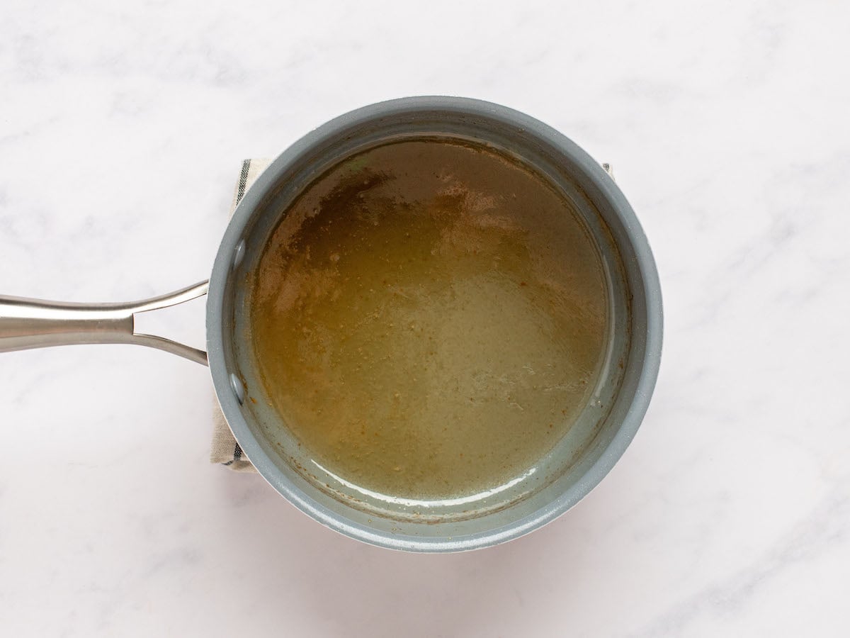 Thickened glaze in a pot.
