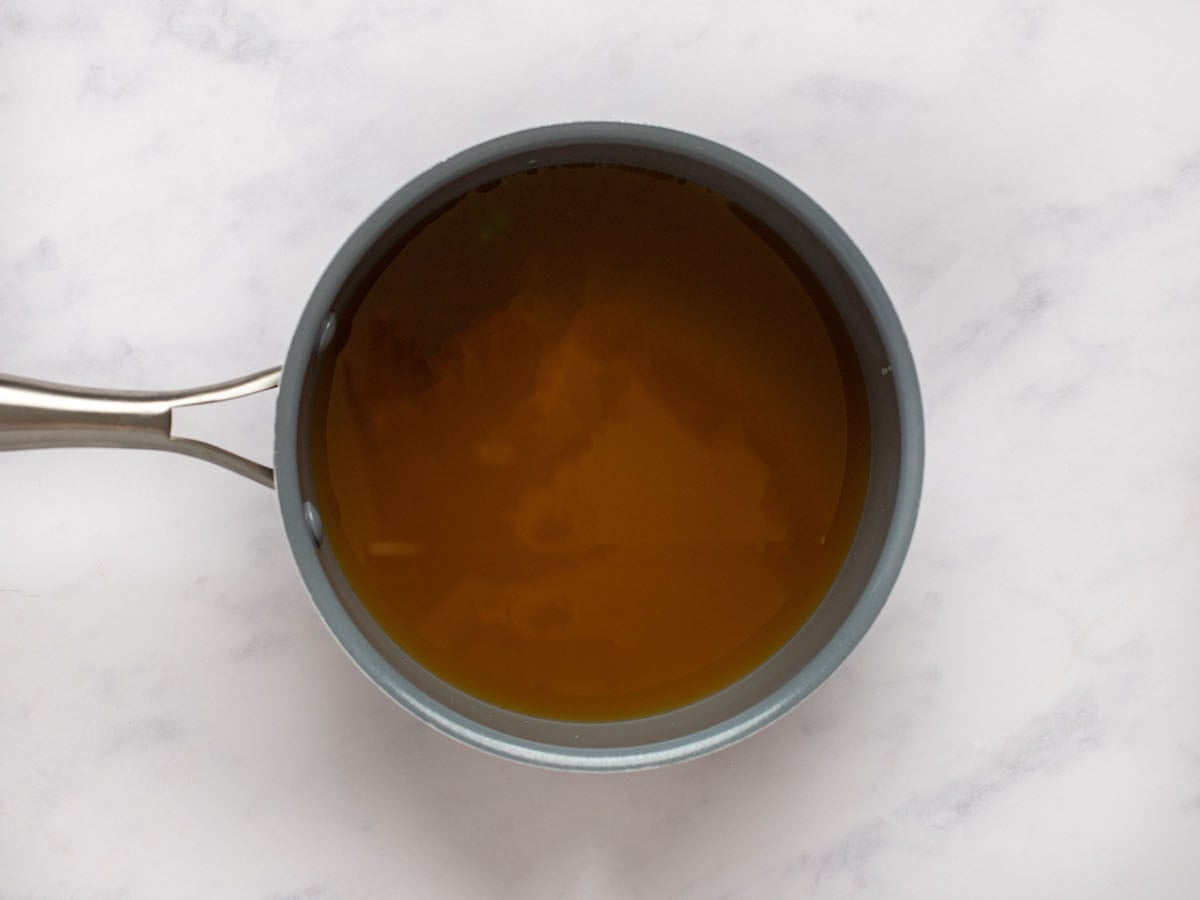 bringing the apple cider to a boil