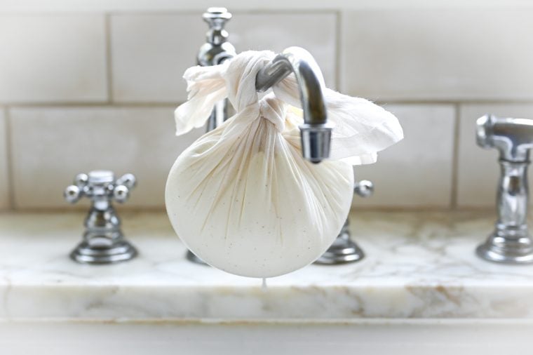 yogurt straining over sink