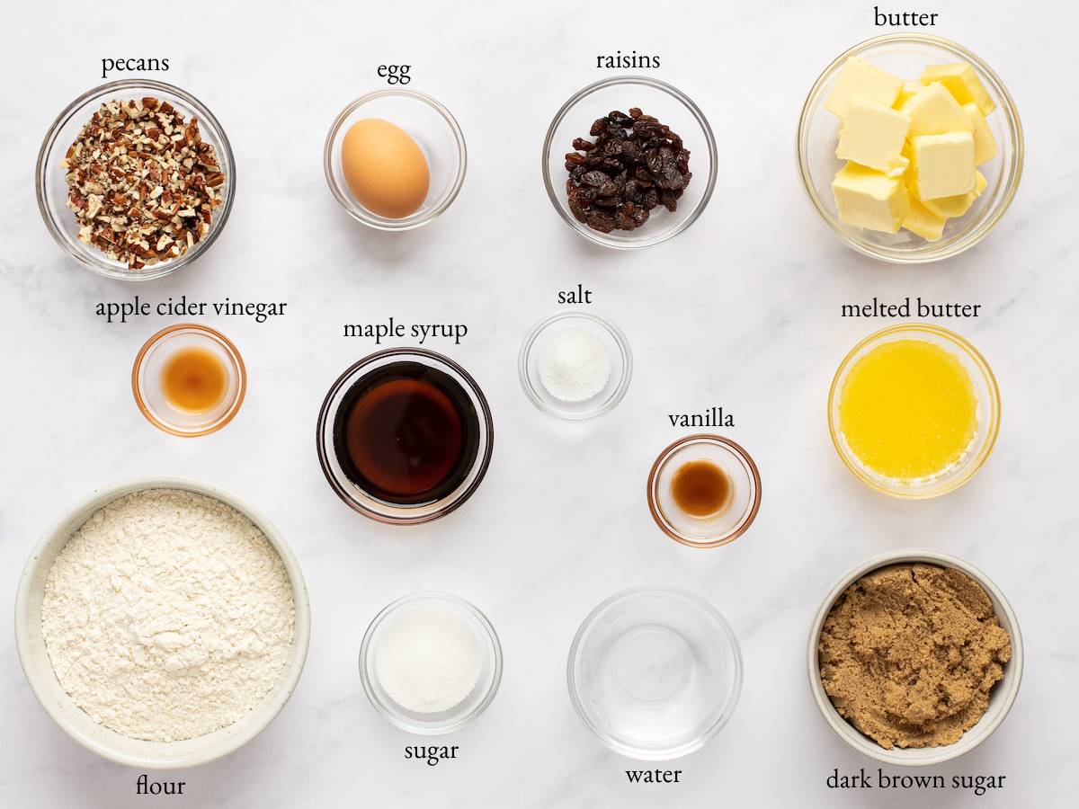 Tart ingredients including maple syrup, raisins, and melted butter.