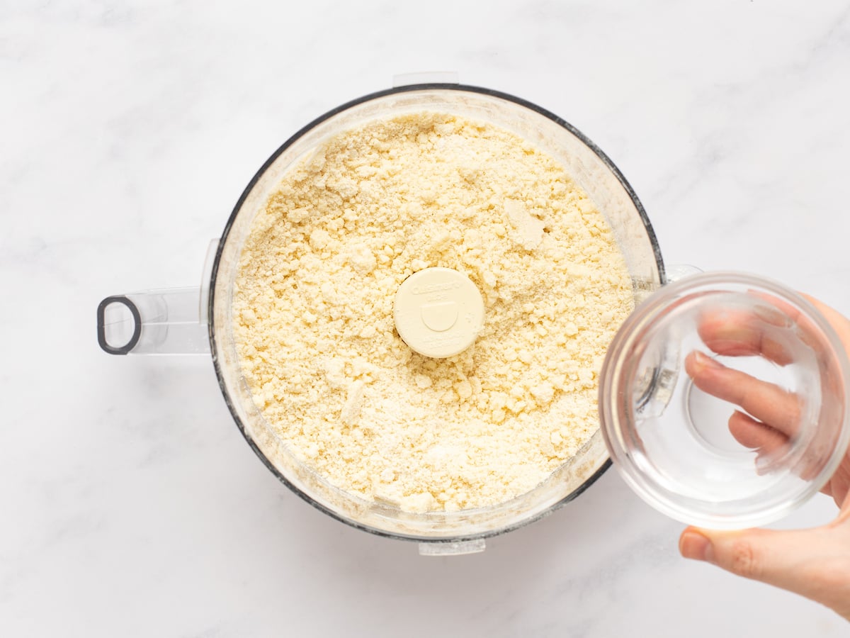 adding water to butter/flour mixture