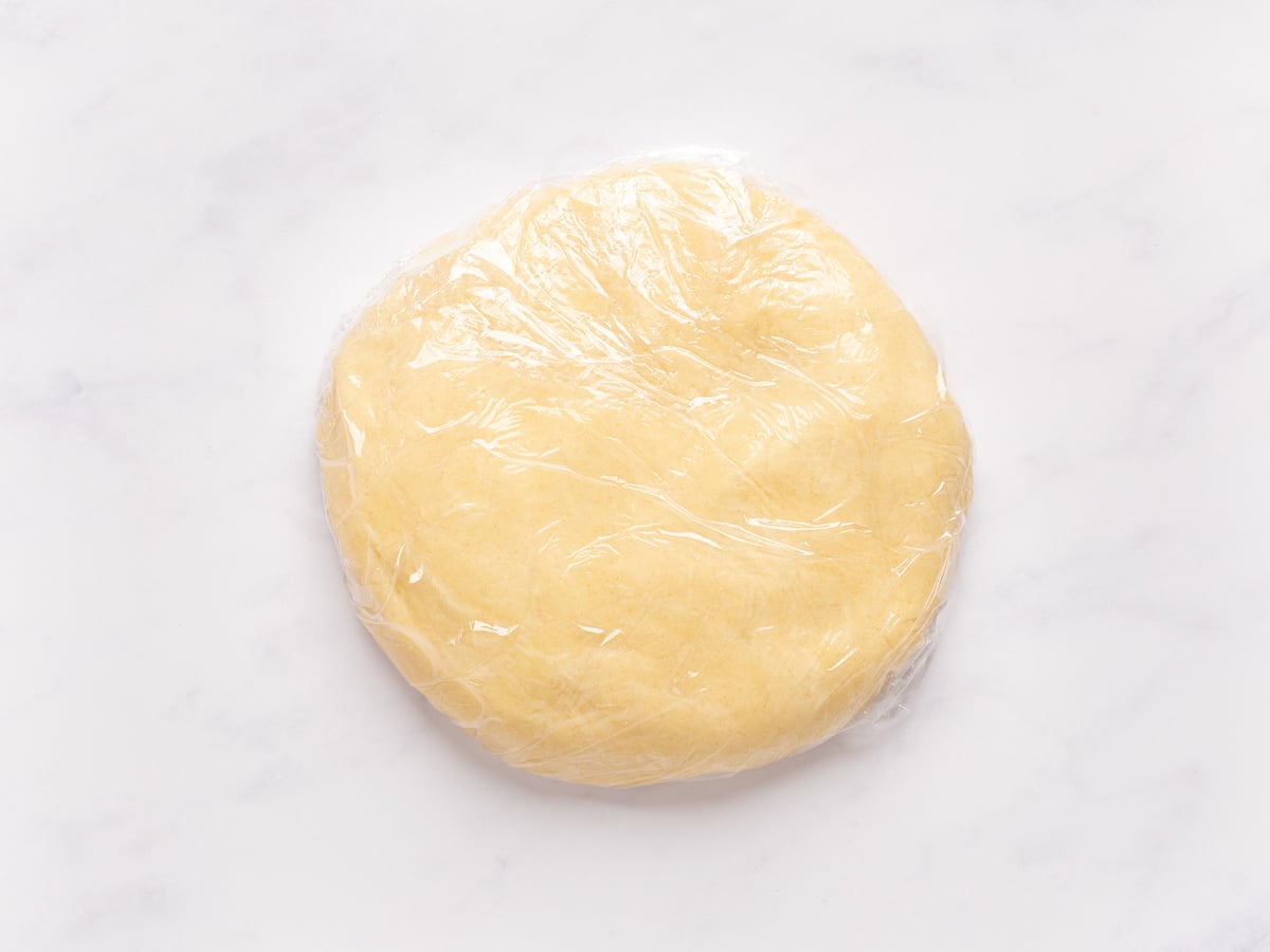 dough wrapped in plastic wrap