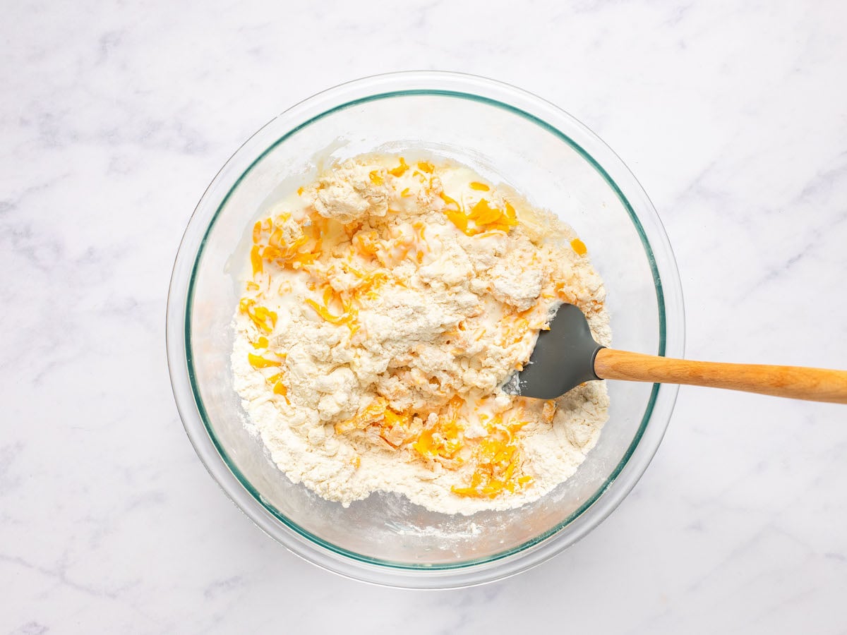 stirring cheese and buttermilk into flour/butter mixture
