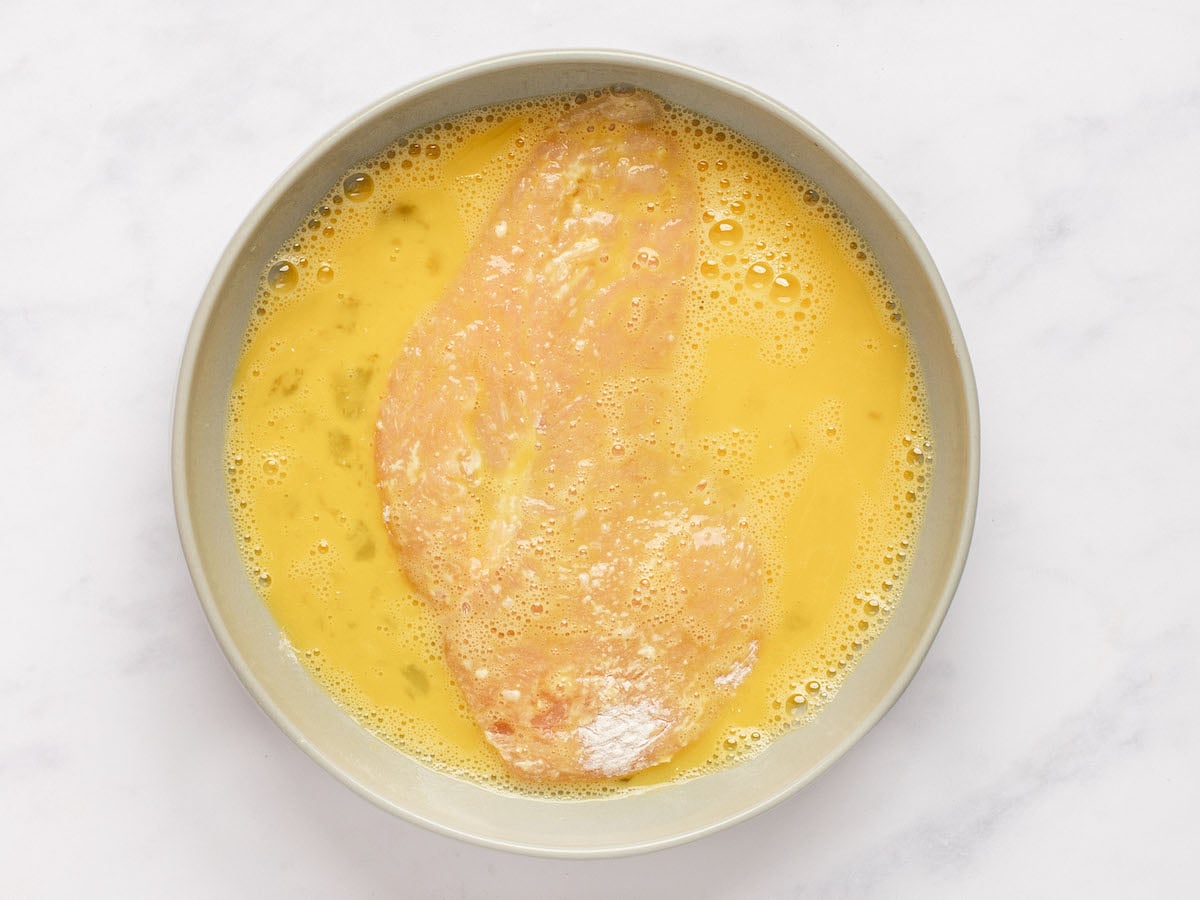 dipping chicken in egg