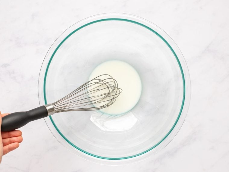 whisking milk and cornstarch in medium bowl