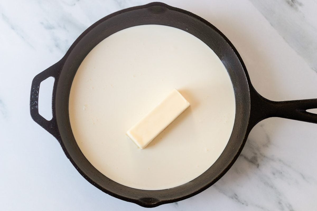 butter and heavy cream in skillet