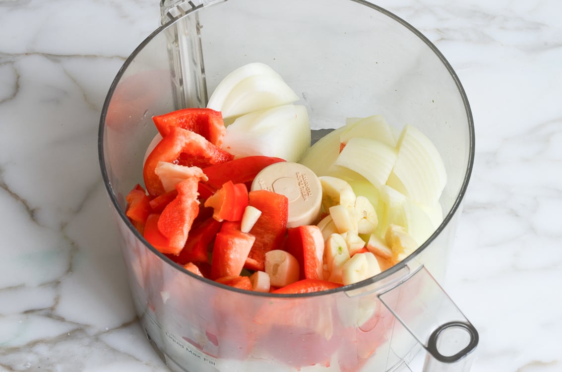 Vegetables for chili in food processor. 