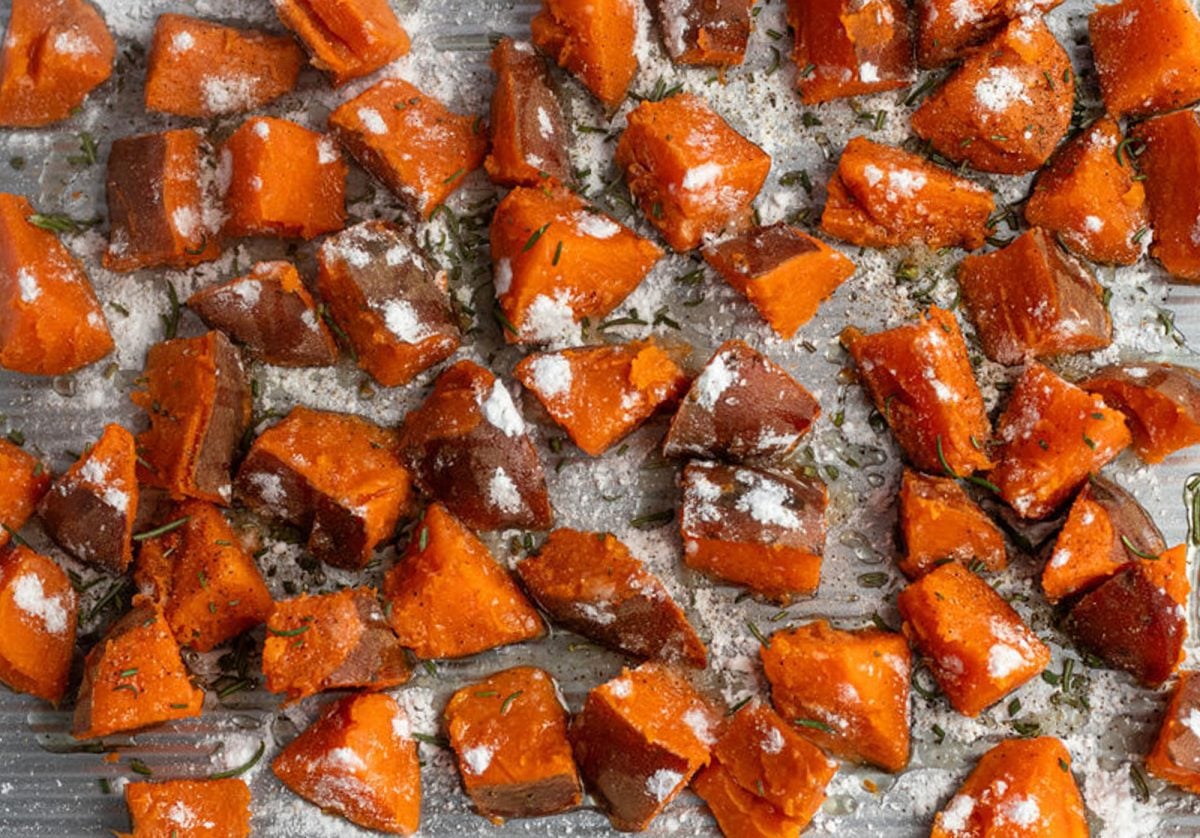 potatoes on baking sheet tossed with potato starch