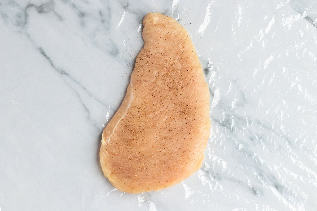 chicken breast seasoned with salt and pepper