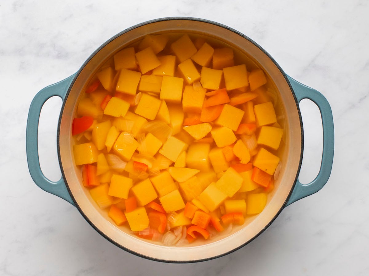 Water and chopped vegetables in a pot.