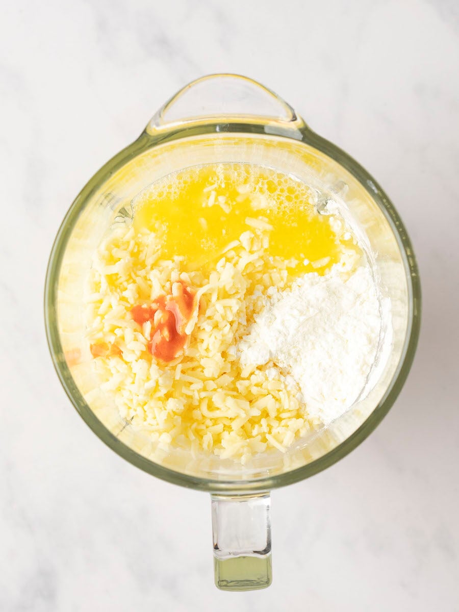 egg whites, cottage cheese, Monterey Jack, butter, cornstarch, salt, and hot sauce in blender