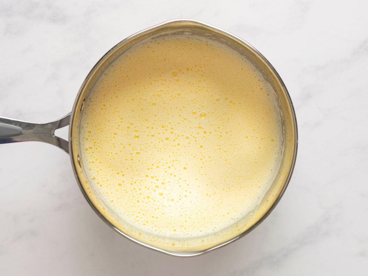 milk/yolk mixture cooking in small saucepan