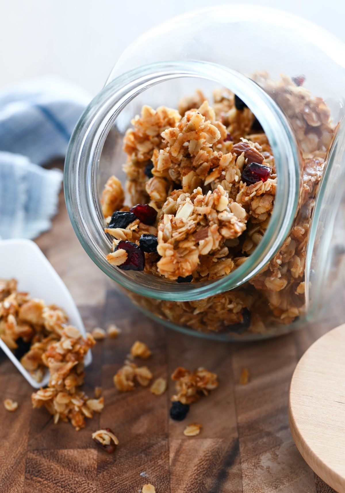 Granola in and around a jar.