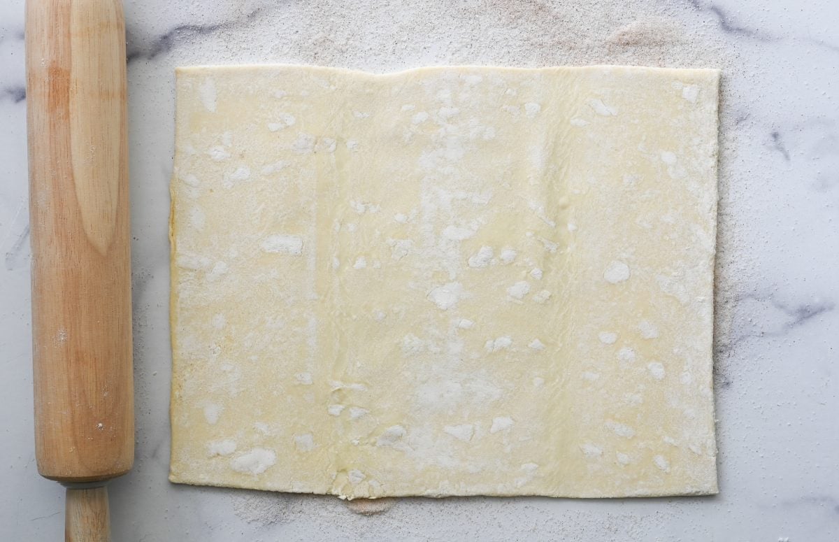 rolled puff pastry with rolling pin