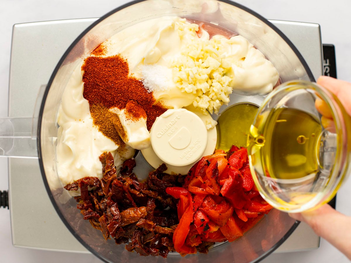 olive oil from jar of sun-dried tomatoes added to food processor bowl
