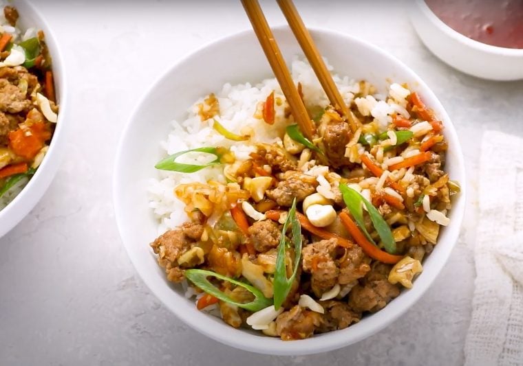 egg roll in a bowl with chopsticks