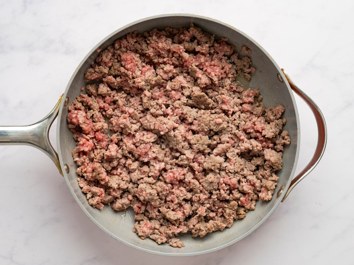Ground beef in a skillet.