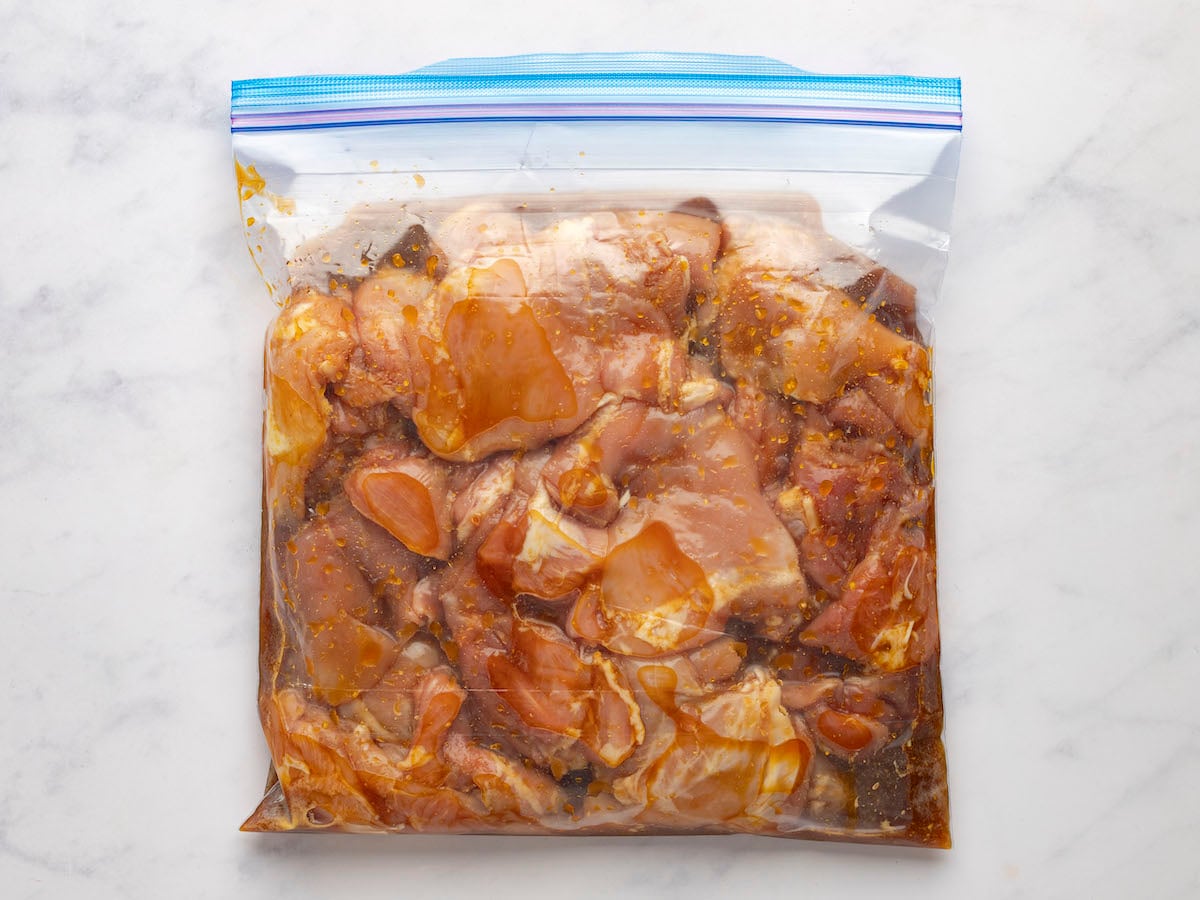 chicken marinating in bag.
