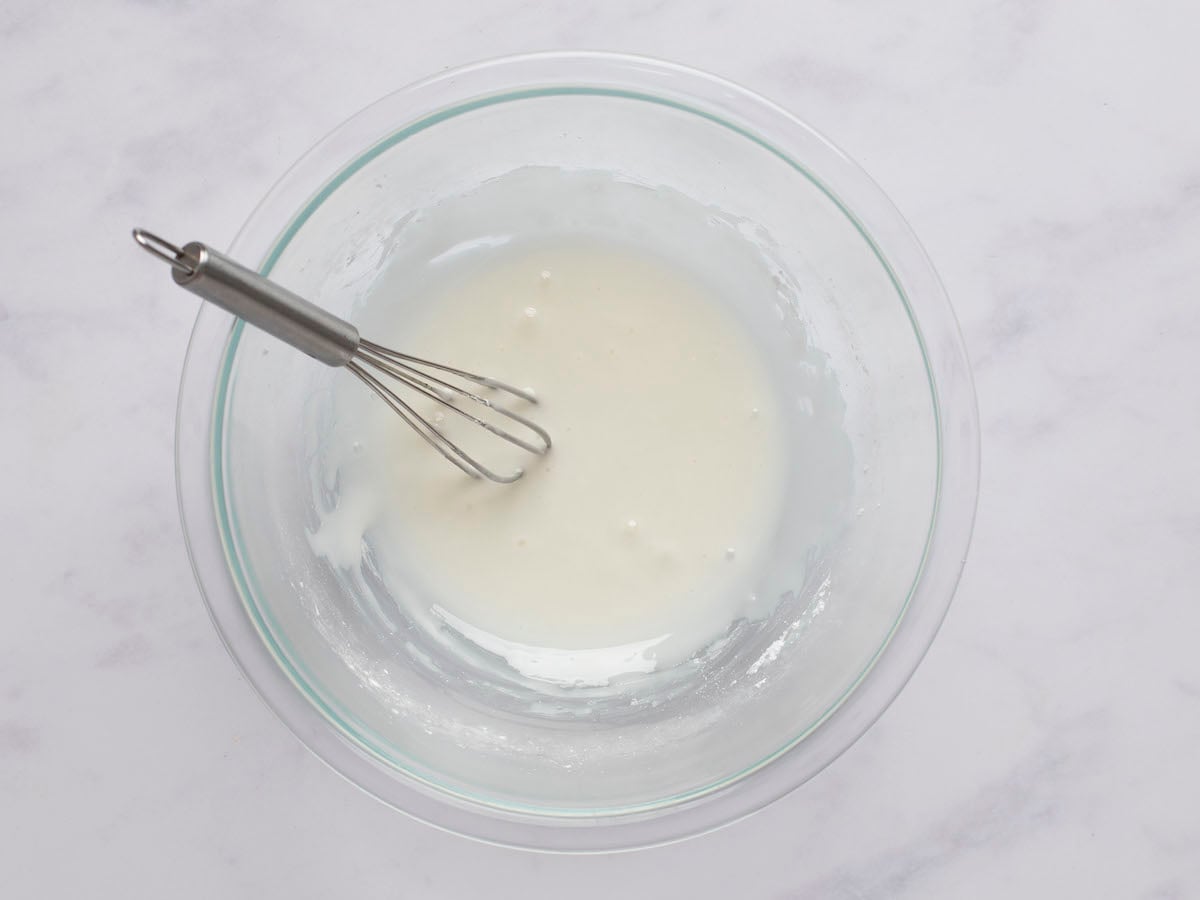 small bowl with lemon juice and confectioners' sugar whisked together